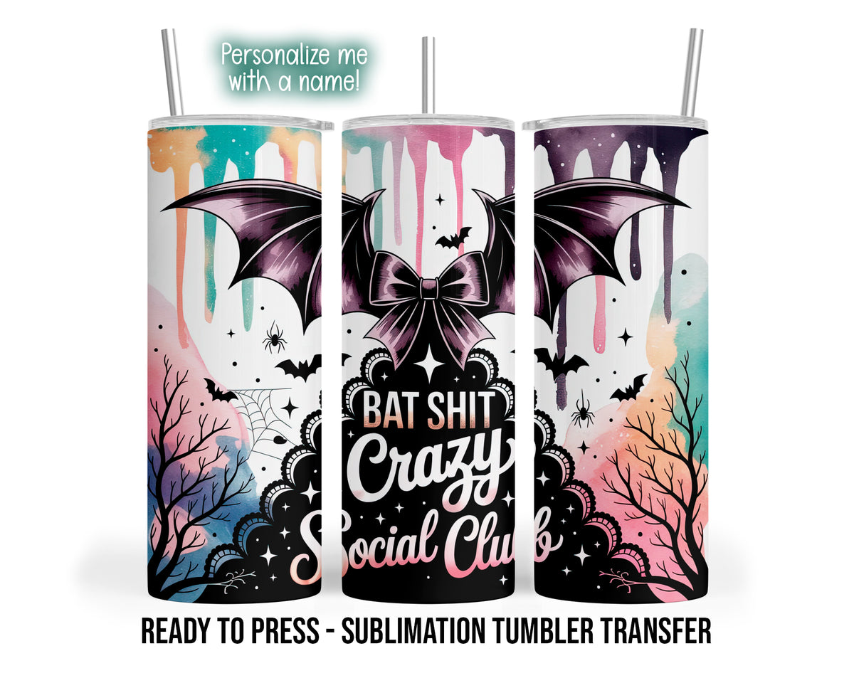 Three tumbler views show a purple bat-wing bow, Bat Shit Crazy Social Club lettering, bats, spiders and pastel paint drips.
