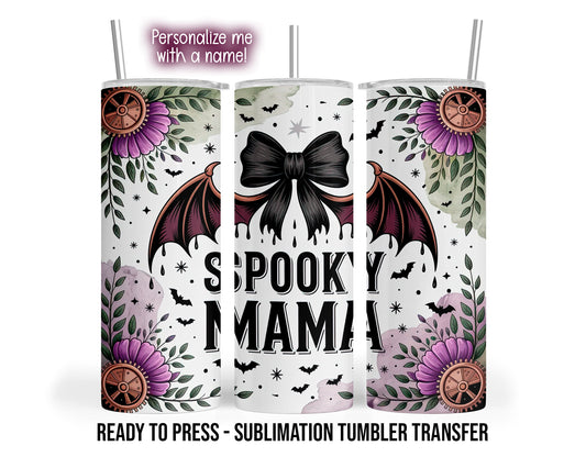 Three tumbler views show Spooky Mama lettering, a black bat-wing bow, purple flowers, green leaves, copper-colored gears and bats.