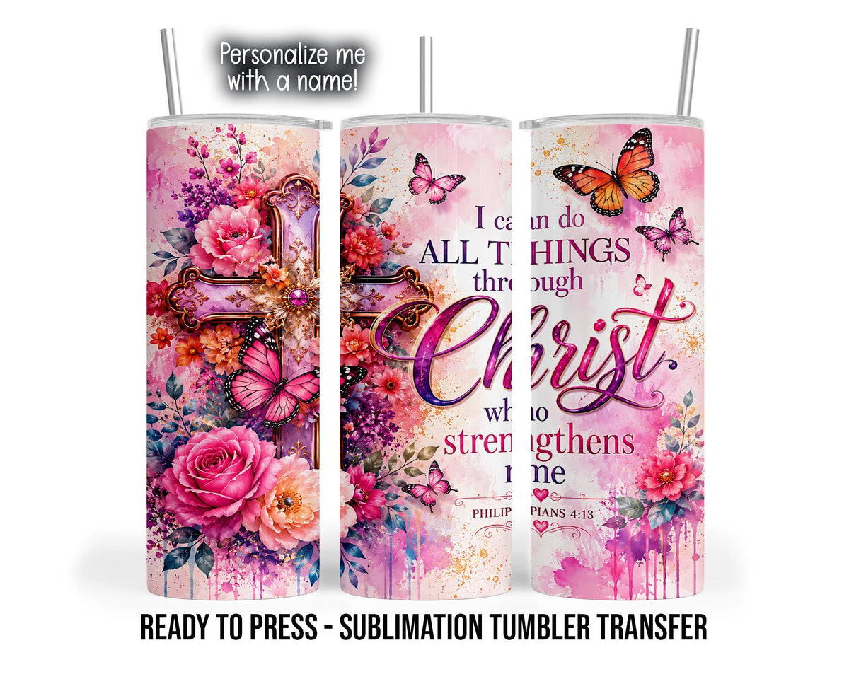 Three tumbler mockup views show a pink watercolor-style design with an ornate purple and gold-colored cross, pink roses, coral flowers, leafy sprigs, and pink and orange butterflies. The scripture reads “I can do all things through Christ who strengthens me,” with Philippians 4:13 below. Large pink and purple script emphasizes “Christ,” surrounded by paint splashes and drips.