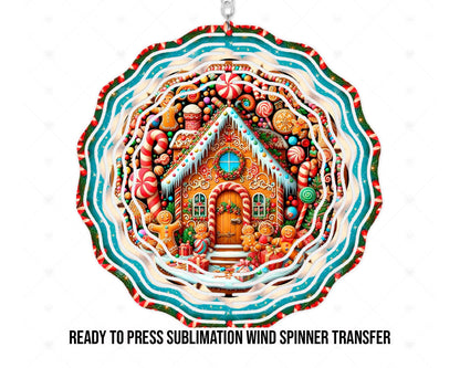 Mockup showing gingerbread house artwork for a printed wind spinner sublimation transfer. The cottage has icy blue frosting, a candy cane doorway, and a wreath around a round teal window. Gingerbread figures, peppermint candies, lollipops, and wrapped gifts surround it, with teal, cream, red, and green scalloped rings framing the scene.