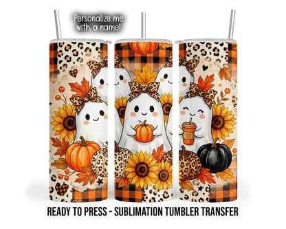 Three tumbler mockup views show smiling white ghosts wearing leopard print bows, including one holding an orange pumpkin and another holding an orange drink cup. Yellow sunflowers, orange autumn leaves, orange and black pumpkins, and leopard-patterned pumpkins fill the design over a cream background with leopard spots and orange-and-black buffalo plaid.