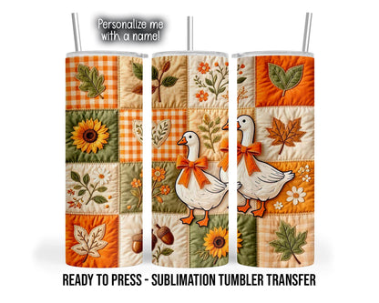 Three tumbler mockup views display a quilt-style patchwork design in orange, cream, and olive green. White geese wear orange bows among gingham squares, sunflowers, daisies, leafy stems, autumn leaves, and acorns. Printed stitch details outline the patches and botanical motifs.
