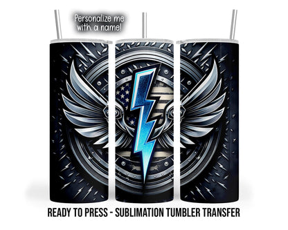 Three tumbler mockup views show a wrap design with a bright blue lightning bolt, sweeping silver-toned wings, and a distressed American flag inside concentric riveted rings. Small silver lightning bolts and a diamond plate pattern fill the black and dark gray background. Clear lids and silver-colored straws appear on the mockups.